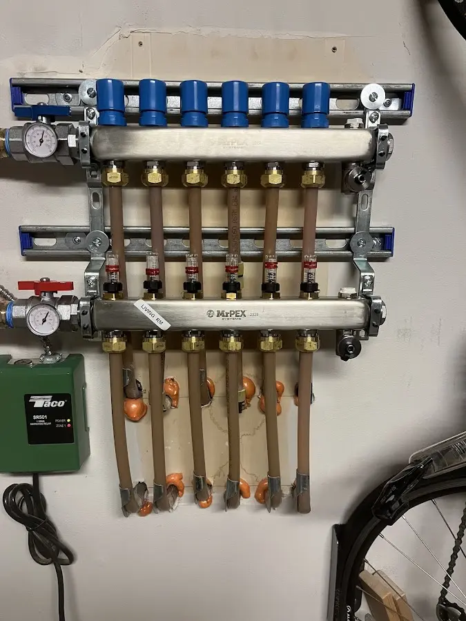 Plumber performing Water Heater Repair at a residential property in Jennings